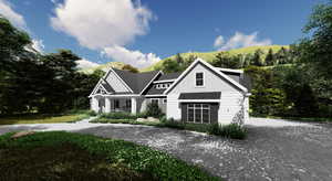 View of front of property featuring curved driveway