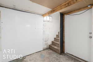 Basement area #1 featuring stairway