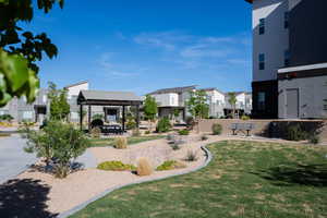 View of yard featuring a gazebo and a residential view