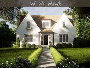 Tudor-style house featuring a front lawn and a chimney