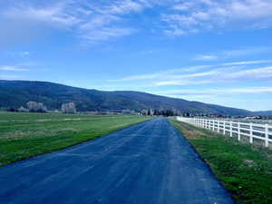 View of road with a mountain view and a rural view