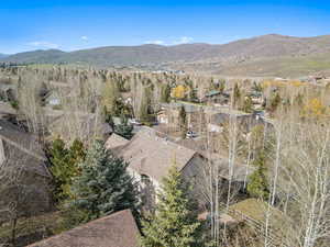 Drone / aerial view featuring a mountain view