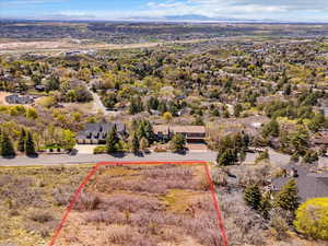 Birds eye view of property with a mountain view