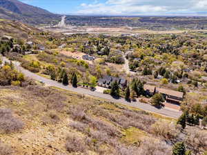 Birds eye view of property with a mountain view
