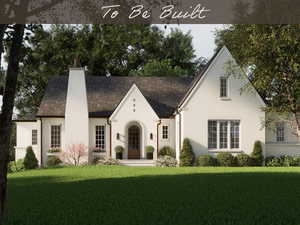 View of front facade featuring a front lawn, a chimney, and brick siding