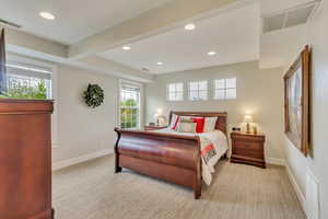 Bedroom featuring visible vents and carpet floors