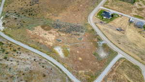 Birds eye view of property featuring a rural view