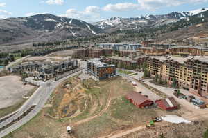 Birds eye view of property with a mountain view