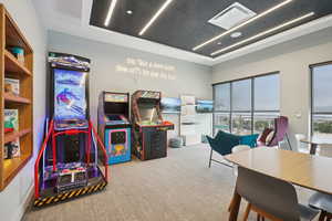 Playroom with visible vents and carpet