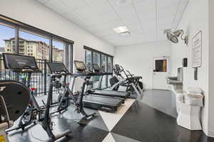 Exercise room featuring a paneled ceiling