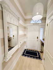 Foyer featuring wood finished floors