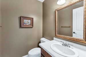 Bathroom with toilet and vanity