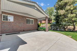 View of patio / terrace with an attached carport