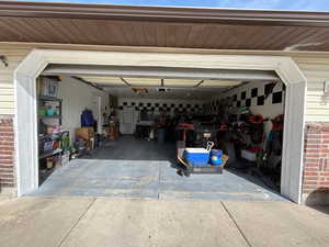 Garage with concrete driveway