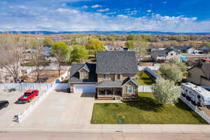 Drone / aerial view featuring a mountain view and a residential view
