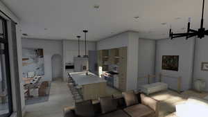 Living area featuring light wood-style floors, visible vents, and arched walkways