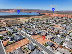 Aerial view featuring a residential view and a water and mountain view