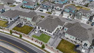 Birds eye view of property with a residential view