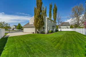 RV parking on south side of home. Room to add about anything your heart desires...
