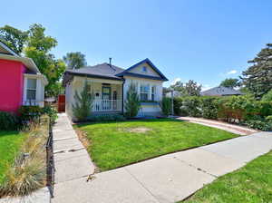 Fully fenced yard with side acces.