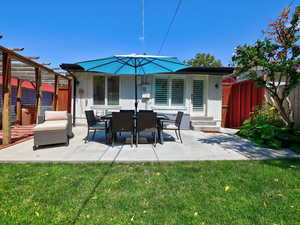 View of patio / terrace featuring fence