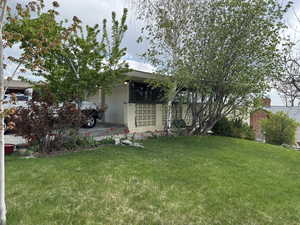 View of yard with a garage