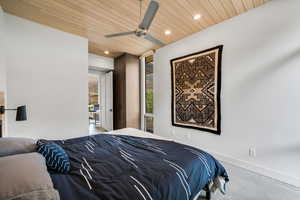 Carpeted bedroom featuring recessed lighting, wooden ceiling, ceiling fan, and baseboards