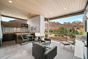 View of patio featuring a mountain view and an outdoor living space