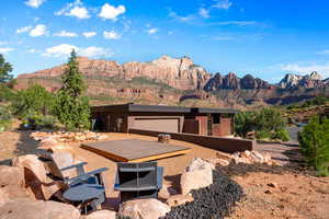 View of front of home featuring a mountain view