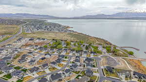 Bird's eye view with a residential view and a water and mountain view