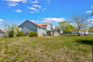 View of yard featuring fence