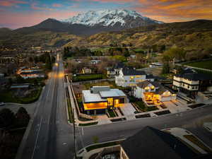 Aerial view at dusk featuring a mountain view