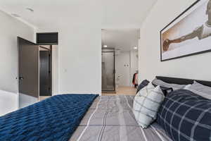 Bedroom featuring visible vents