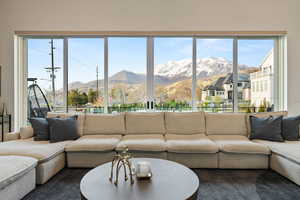 Living room featuring a mountain view and a wealth of natural light
