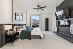 Bedroom featuring ceiling fan, recessed lighting, and carpet floors