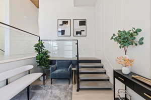Staircase with wood finished floors