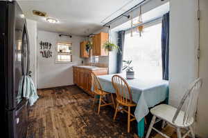 Dining room featuring dark wood finished floors