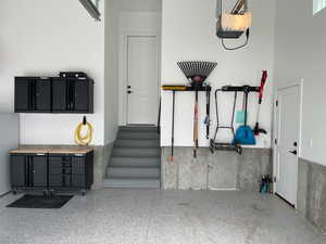 Garage featuring a garage door opener