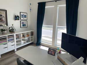 Office area featuring wood finished floors