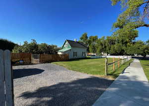 View of yard featuring a gate and fence private yard