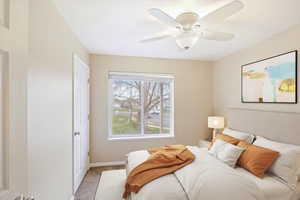 Main floor second bedroom virtually staged.