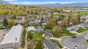 Birds eye view of property featuring a mountain view and a residential view
