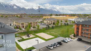 Drone / aerial view featuring a mountain view and a residential view