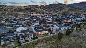 An expansive aerial perspective showcasing the surrounding neighborhood, highlighting its layout and charm.