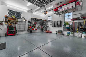 An impressive oversized three-car garage, offering ample space for vehicles, storage, and all your needs.