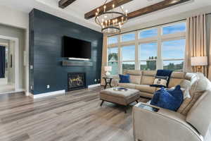 A warm and inviting living space enhanced by luxurious finishes and elegant design details, offering both comfort and sophistication.