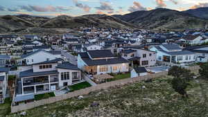This home enjoys a scenic backdrop of the expansive 70-acre Juniper Canyon Recreation Area, offering stunning views and natural beauty.
