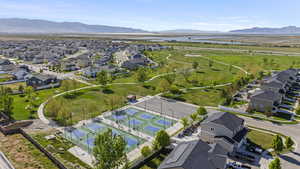 Aerial view featuring a water and mountain view and a residential view