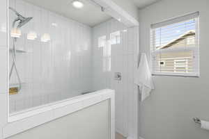 Full bath with a walk in shower and recessed lighting