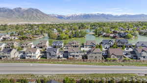 Aerial view with a residential view and a water and mountain view